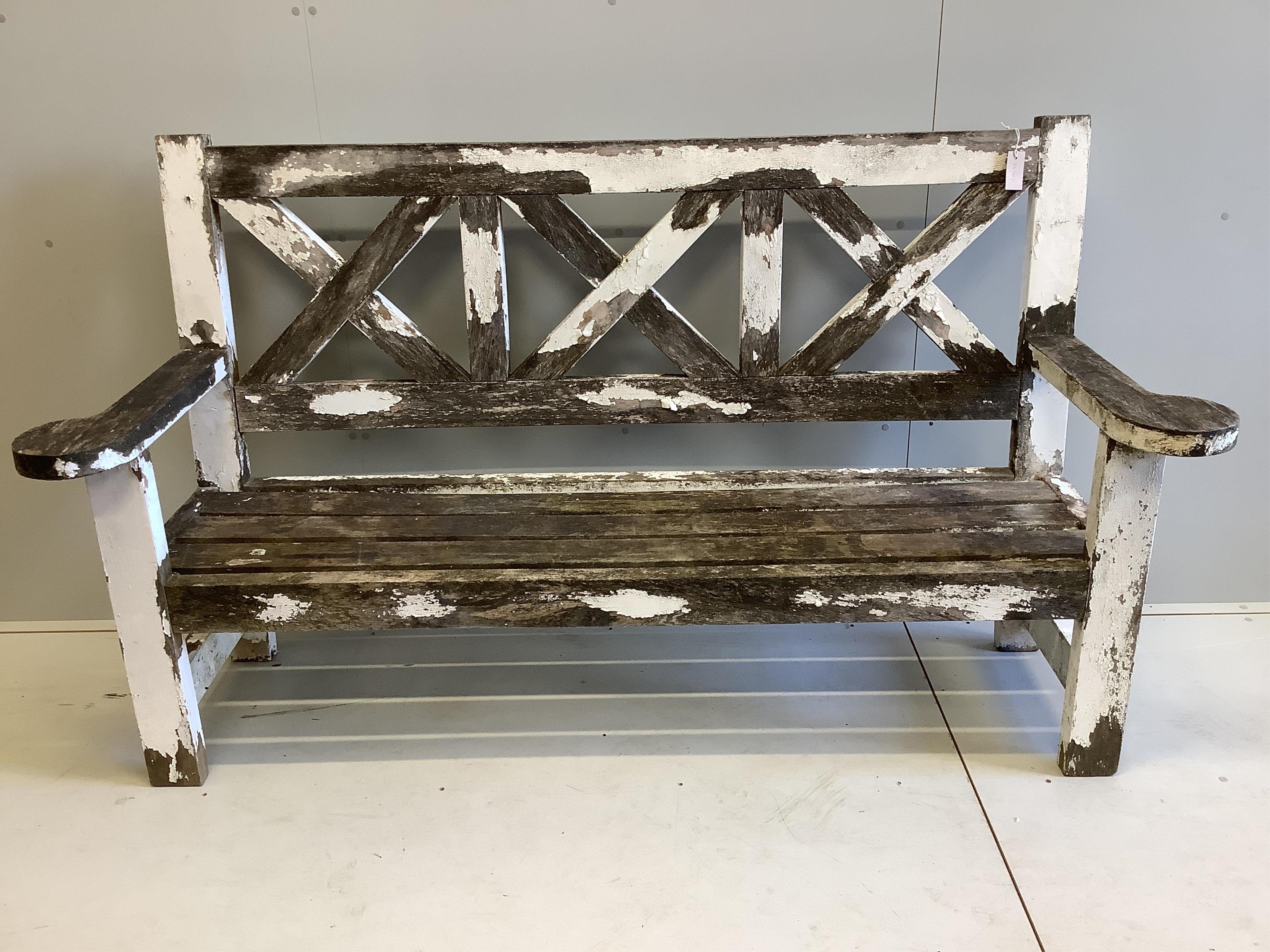 A 'country house' weathered teak garden bench, width 193cm, depth 60cm, height 110cm. Condition - fair